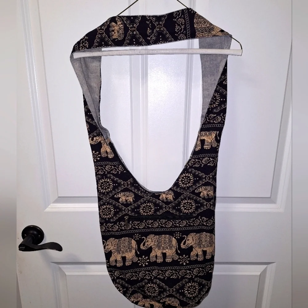 An Elephant print shoulder or crossbody bag. Large, stylish bag.
